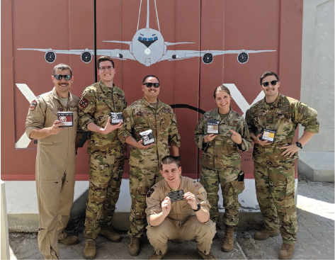 Members of the US Army with their bags of Alpha Coffee